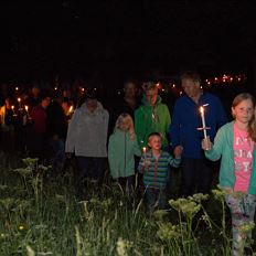 Torchlight hike in summer in Going