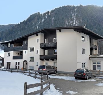 Alpen-Apartment-Soell-Ried-14-Haus-Winter