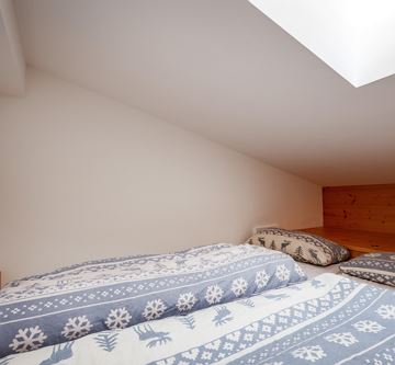 Berghof_Kirchbichl_Ellmau_Top_94_Schlafzimmer_3