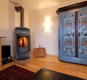 Wohnzimmer mit finnischen Ofen