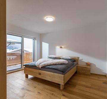 Ferienwohnung_Feger_Oberfeld_35_Scheffau_Schlafzim