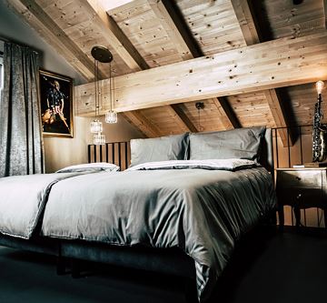 Söll_AparthotelOldSchool_Schlafzimmer_WilderKaiser