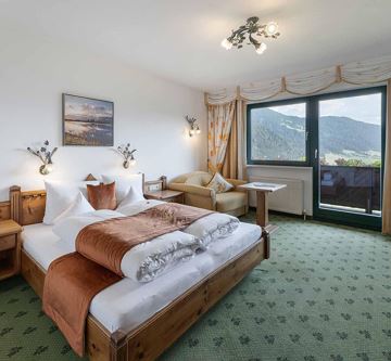 Söll_Hotel_AlpenSchlössl_Zimmer_WilderKaiser