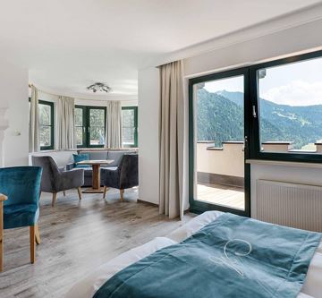 Söll_Hotel_AlpenSchlössl_Zimmer_WilderKaiser