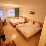 Hotel-room with 4 beds-shower or bath tube, WC