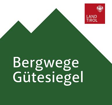 Logo of "Bergwege Gütesiegel" with green mountain graphic and red "Land Tirol" label in the corner.